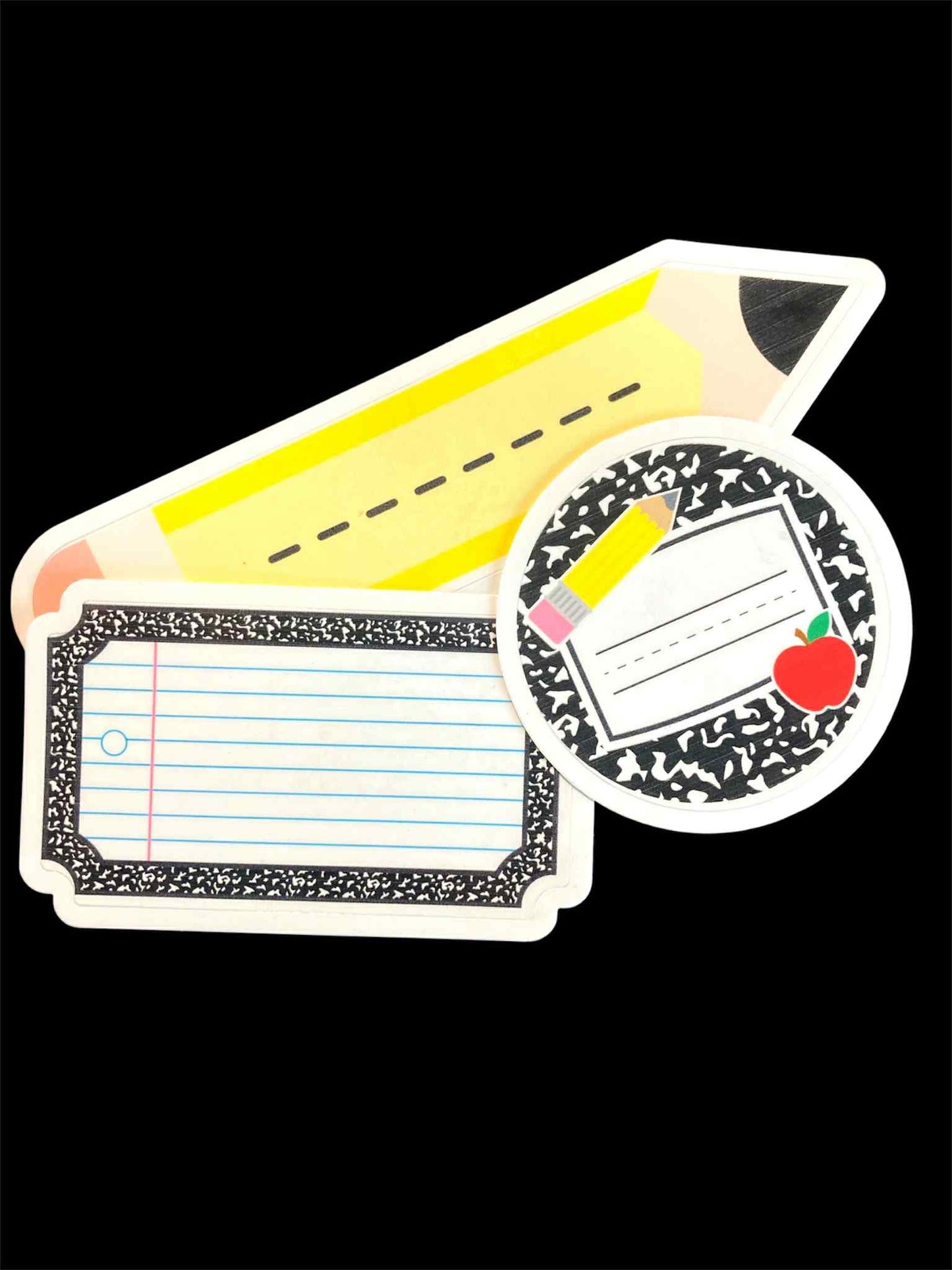 Pencil-shaped notepad with lined pages and a small inset showing a page.