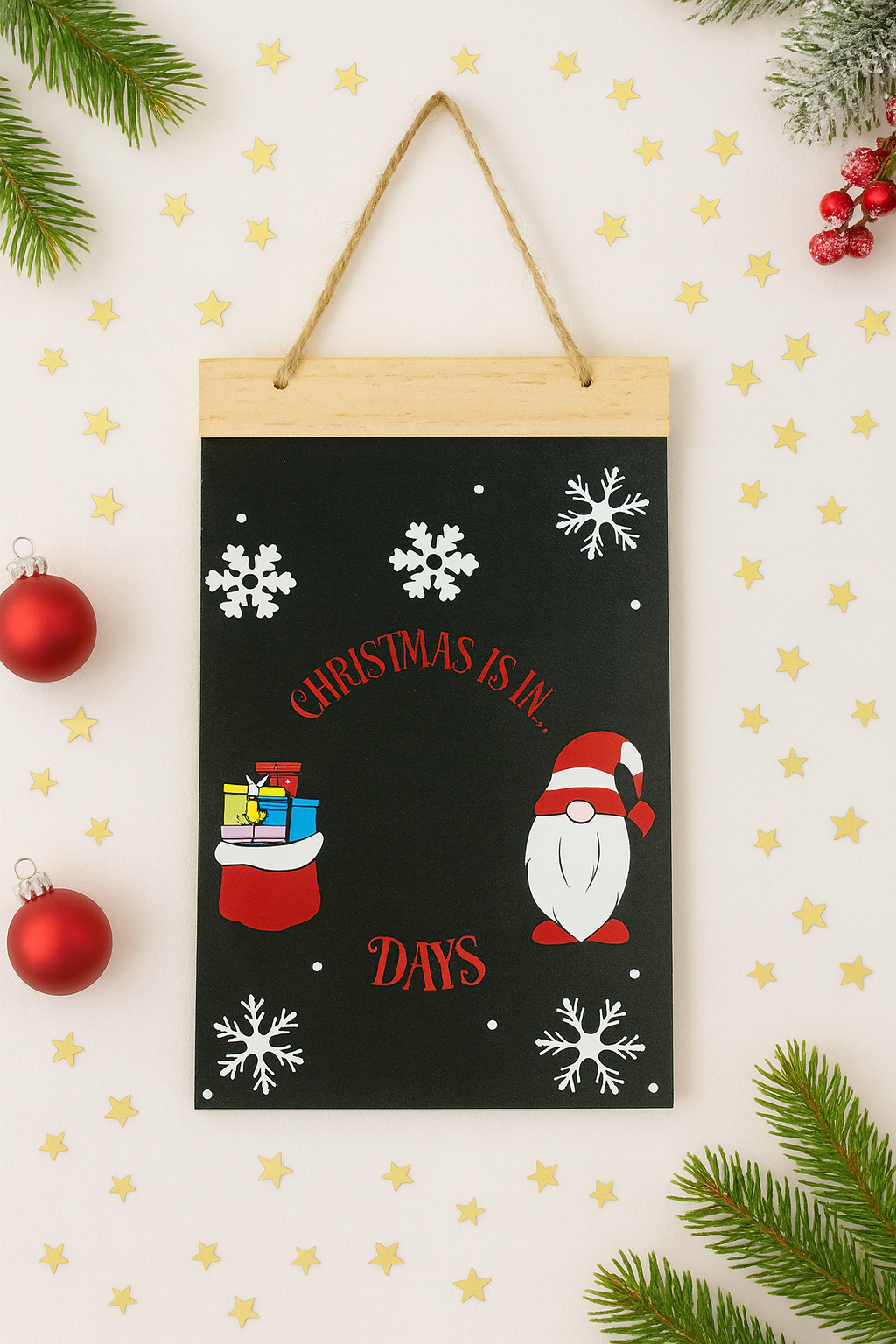 Christmas countdown sign with Santa Claus illustration on a decorative background with stars and ornaments.