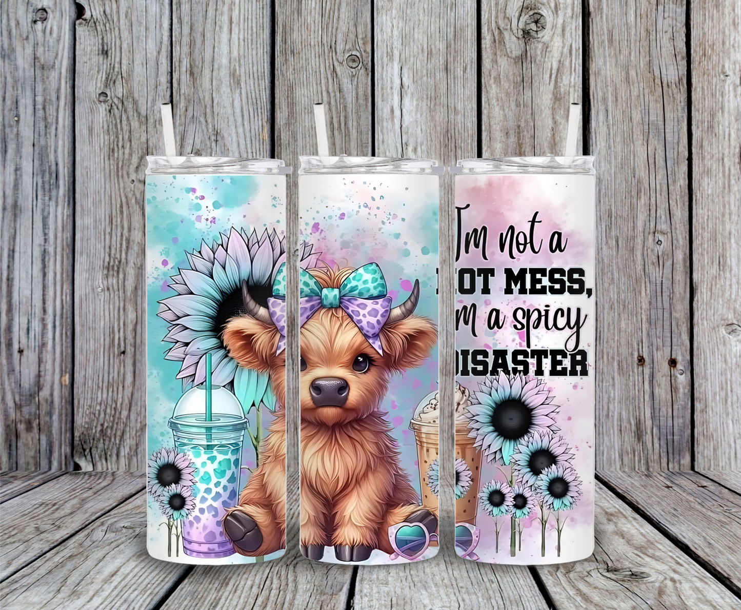 Highland cow tumbler with pastel sunflowers, iced coffee cup, and funny quote “I’m not a hot mess, I’m a spicy disaster.”