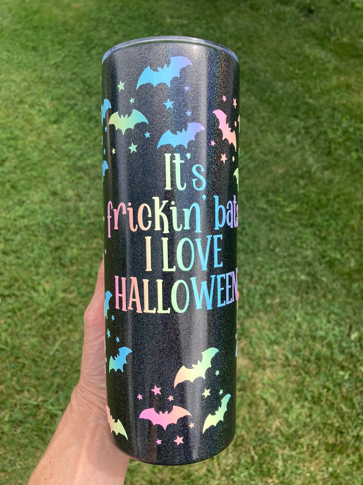 Black glitter tumbler with pastel bats and “It’s frickin bats I love Halloween” text