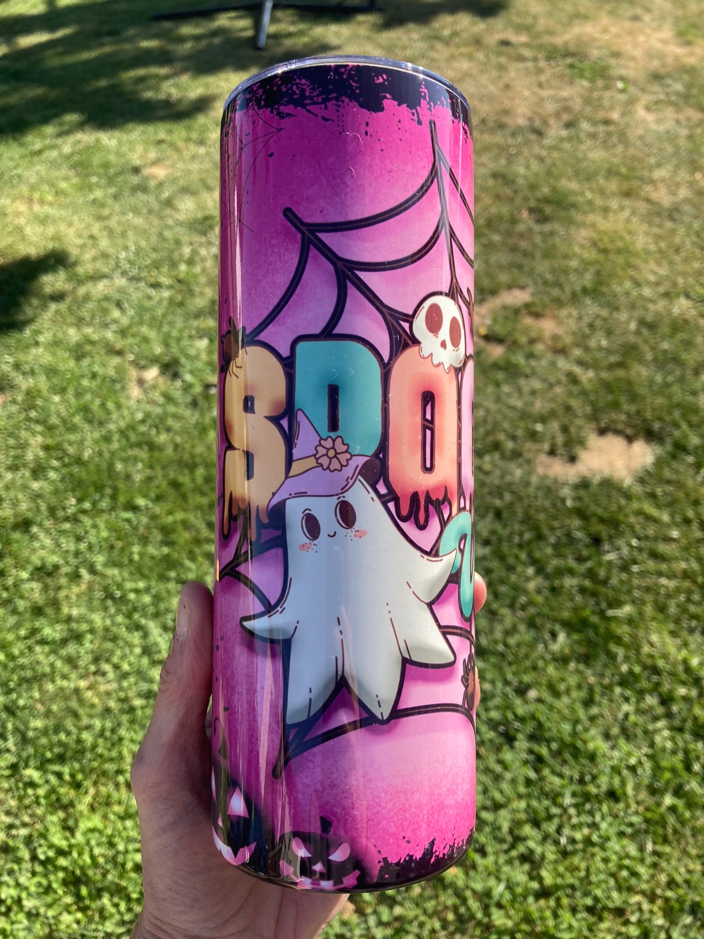Pink spooky ghost tumbler with dripping design and cute ghost illustration