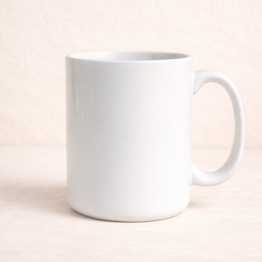 White mug on a light pink background