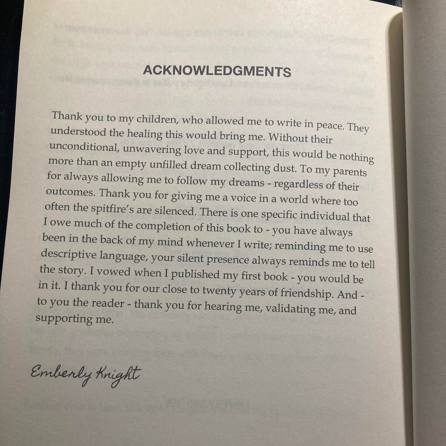 Open book showing an acknowledgments page with text and