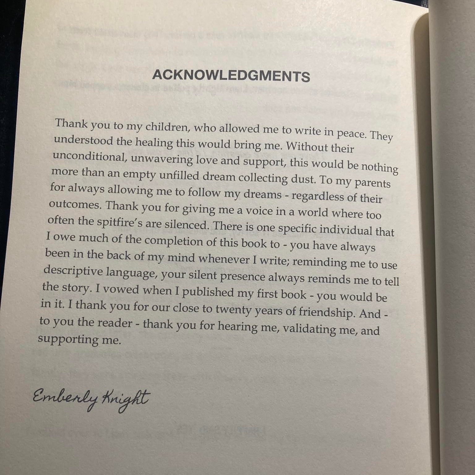 Open book showing an acknowledgments page with text and