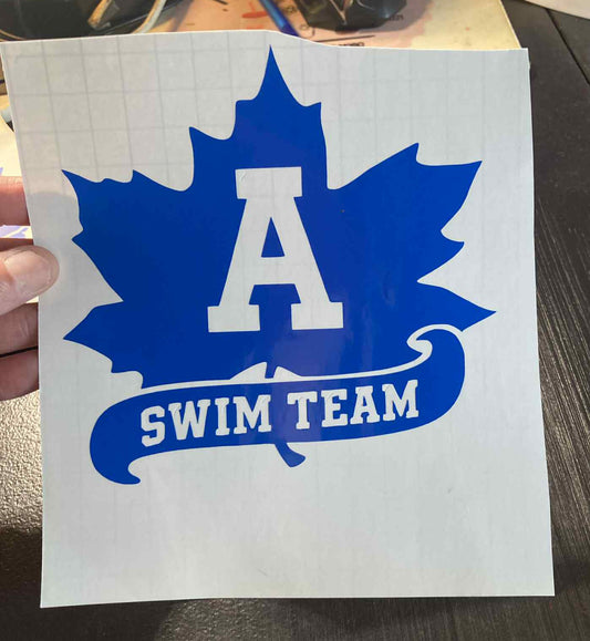 Blue Adrian Maples swim team decal featuring a maple leaf with large “A Swim Team” text and wave graphic – durable vinyl for cars, laptops, and swim gear
