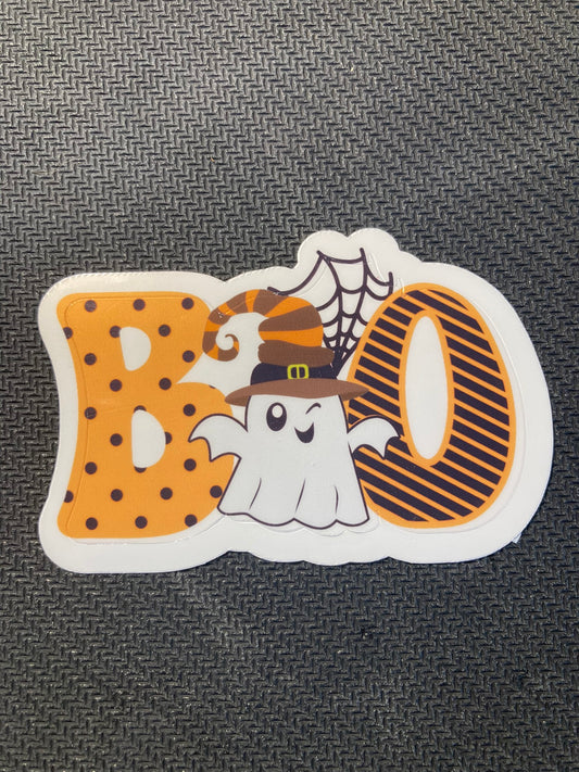 Sticker with the word “BOO” in orange patterns and a ghost wearing a striped witch hat.