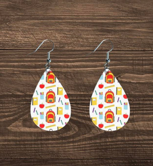 Teardrop shaped; Bookbag, school supplies, back to school clip art patterned teacher earrings. 