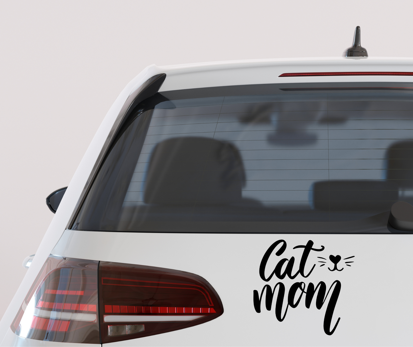 Cat Mom vinyl decal with paw print design, perfect sticker for cat lovers to decorate cars, laptops, tumblers, and water bottles.