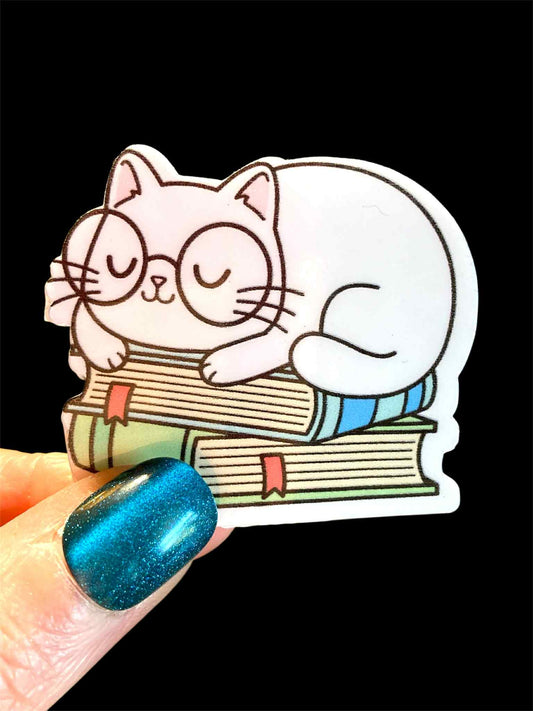 Cute Cat Sleeping with Books waterproof sticker