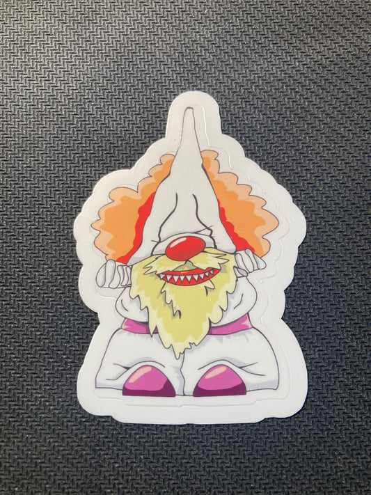 Halloween sticker of a gnome dressed as a creepy clown with red hair, sharp teeth, and colorful outfit.