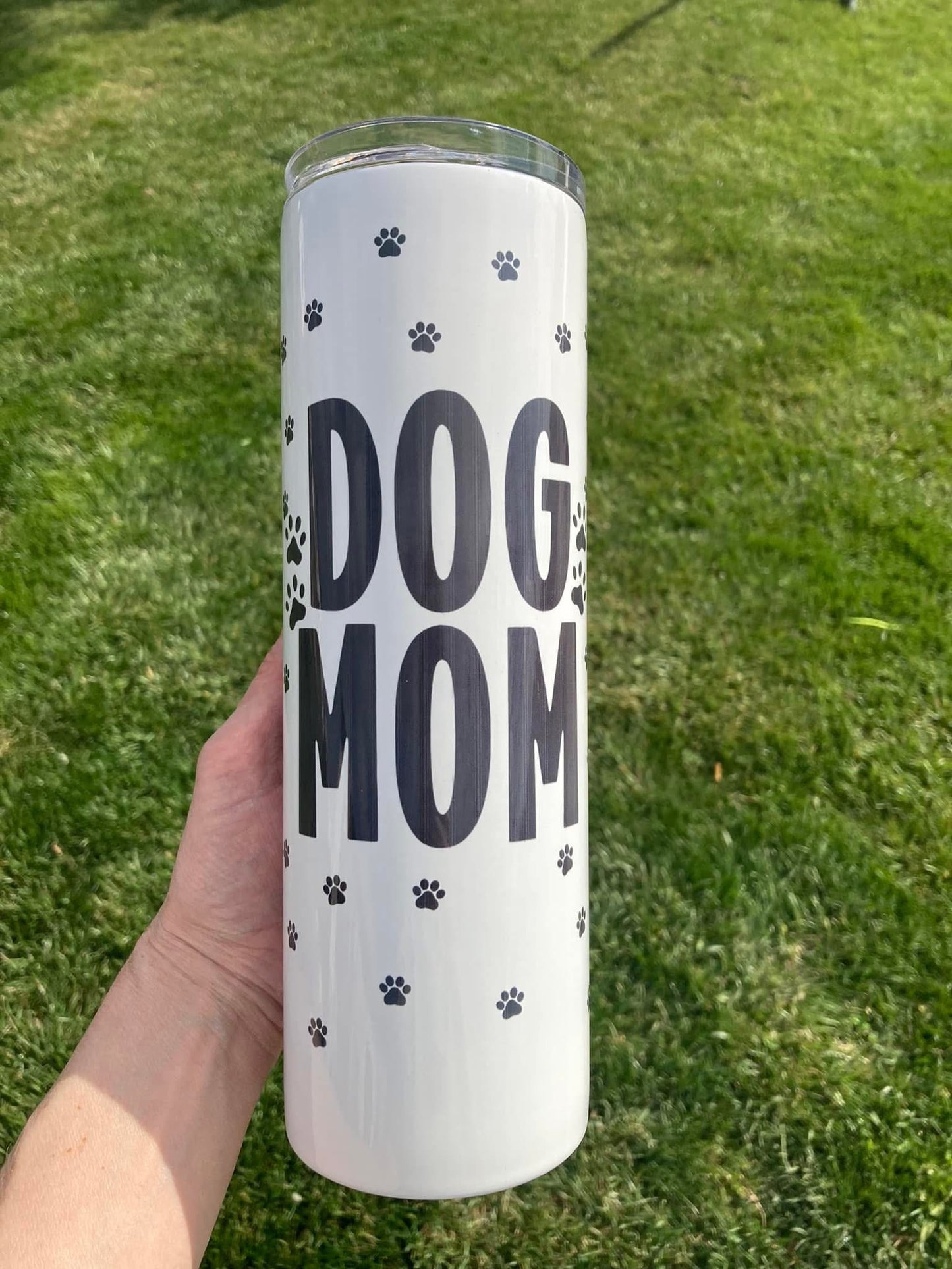 20oz white tumbler with bold “Dog Mom” text and black paw prints.