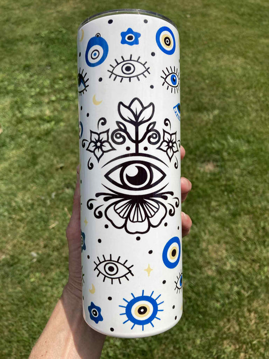 Evil Eye protection tumbler with blue Nazar amulet and mystical eye symbols, 20oz insulated stainless steel skinny cup.