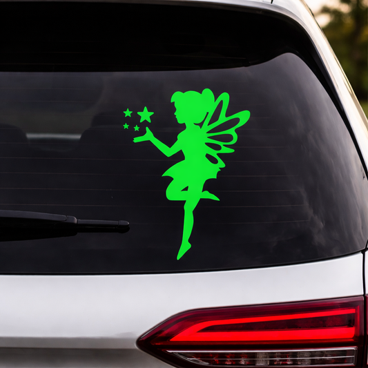 Green fairy decal on a car's rear window