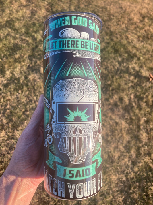 Black and neon green tumbler featuring skull welding helmet design with humorous welder quote