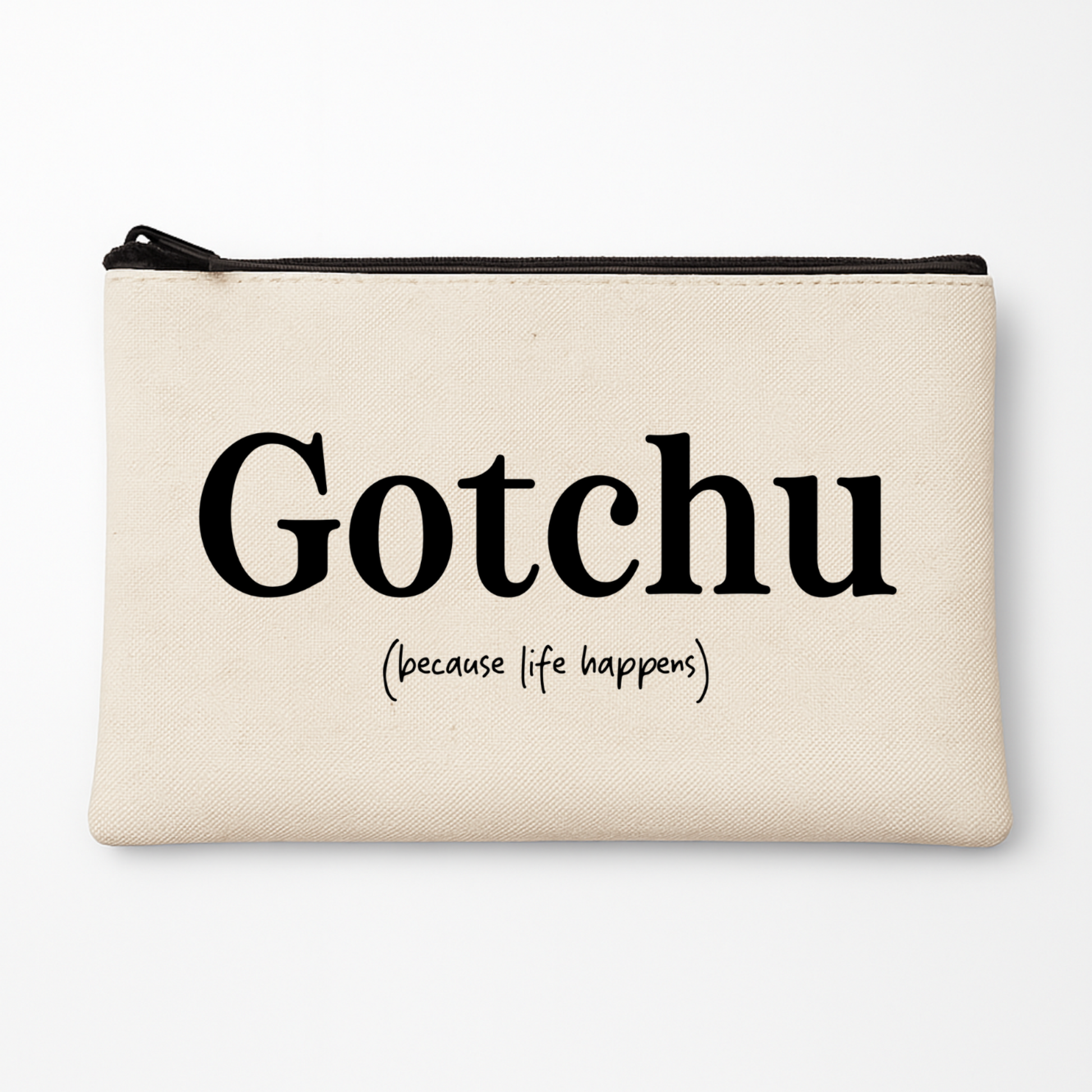 Beige pouch with 'Gotchu (because life happens)' text on a white background