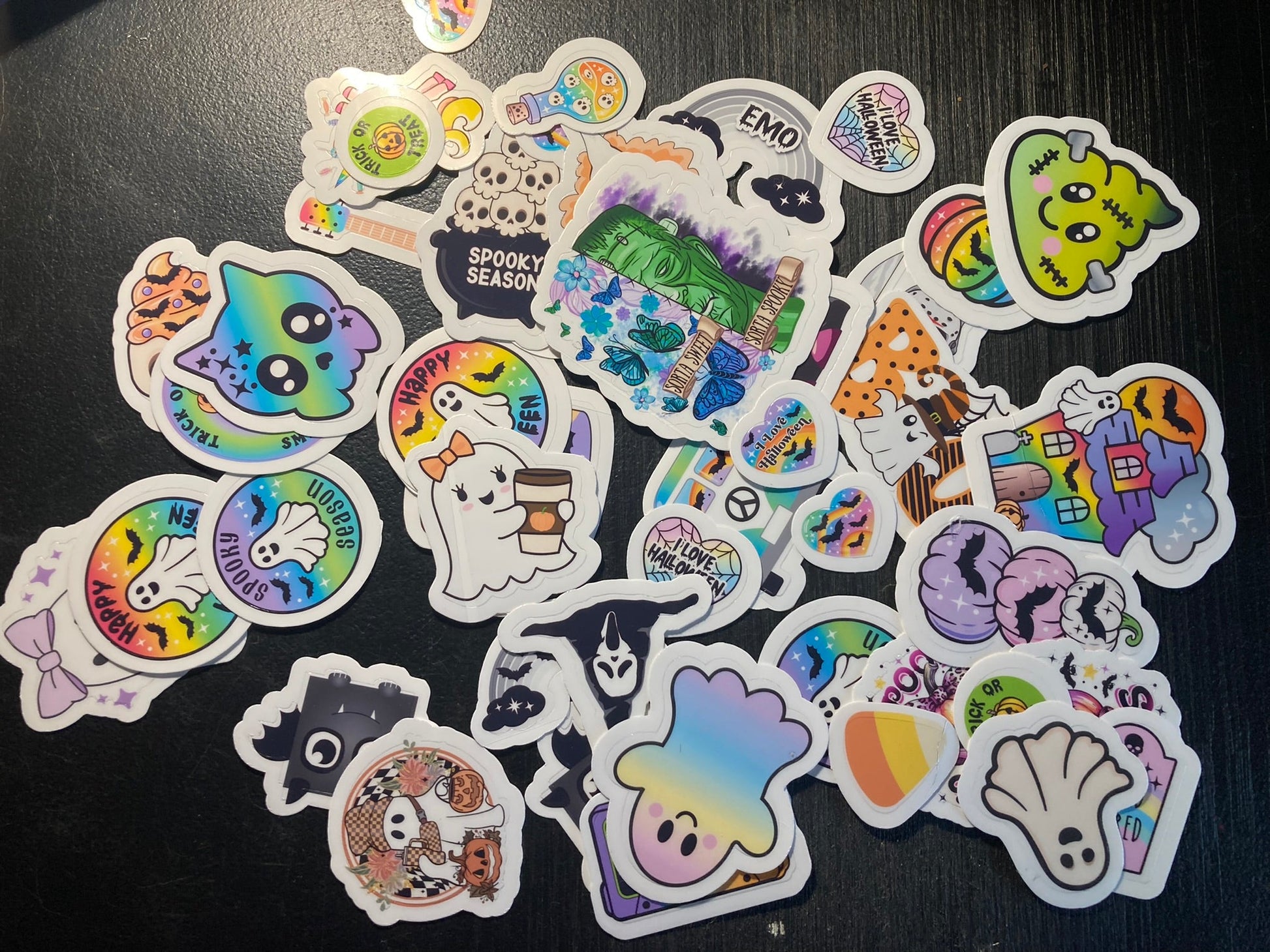 Collection of colorful stickers on a dark surface