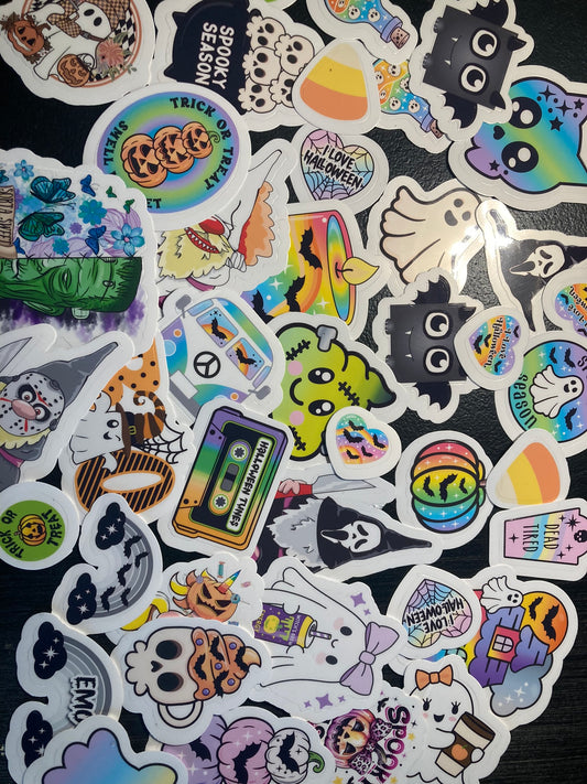 Collection of colorful stickers with various designs on a black background