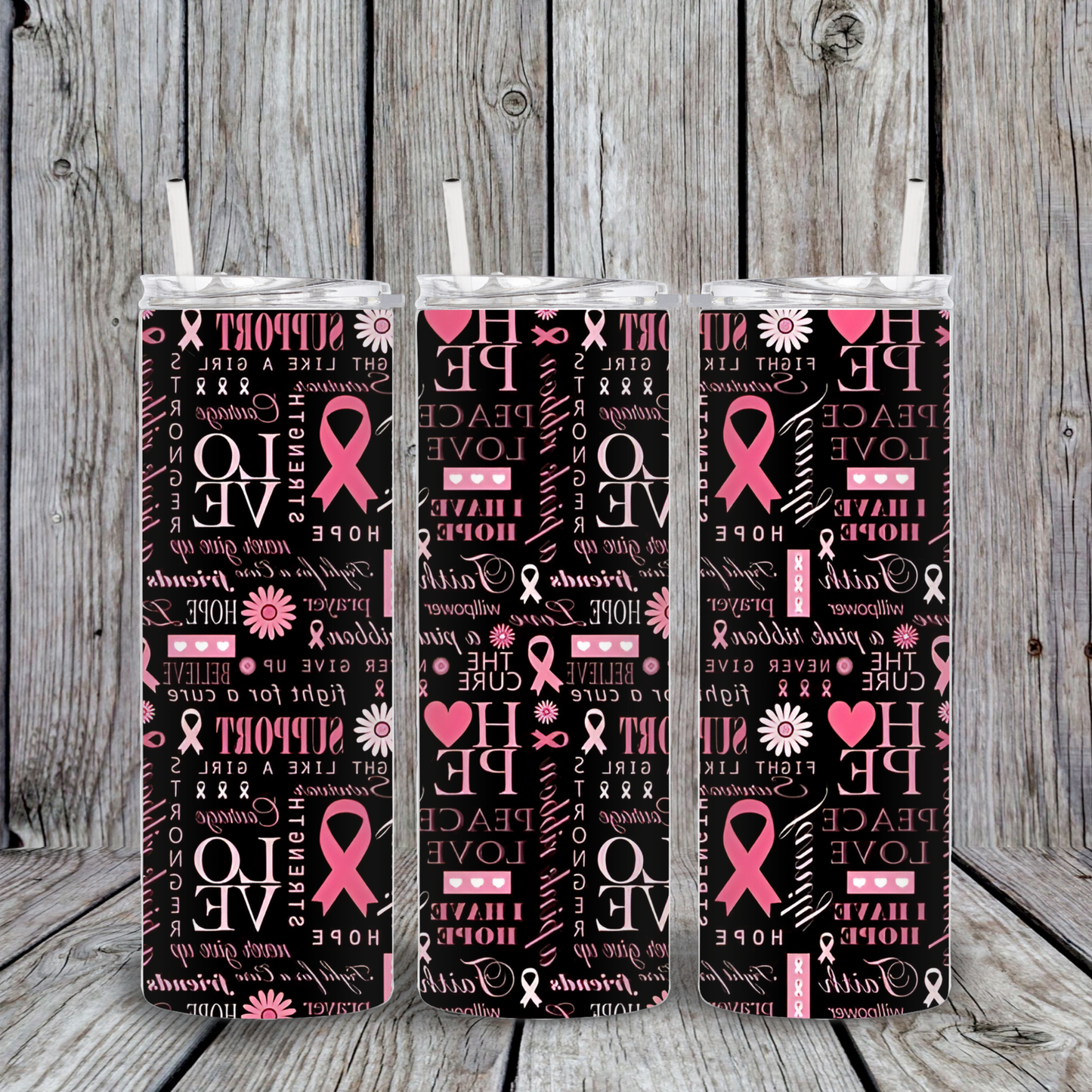 Black tumbler covered in pink ribbon symbols and inspiring words like Hope, Love, Support, and Strength in a collage-style design.