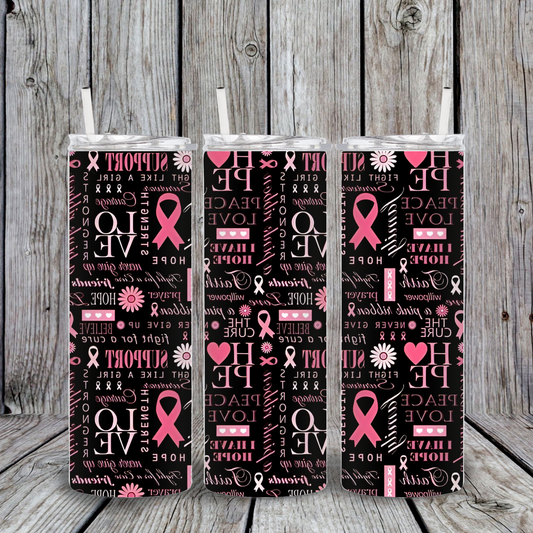Black tumbler covered in pink ribbon symbols and inspiring words like Hope, Love, Support, and Strength in a collage-style design.