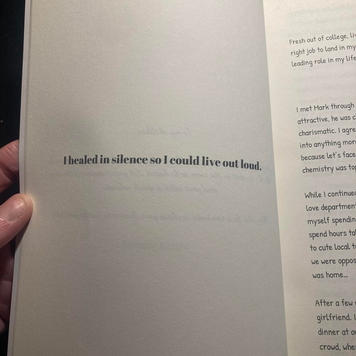 Open book with a quote on a white background