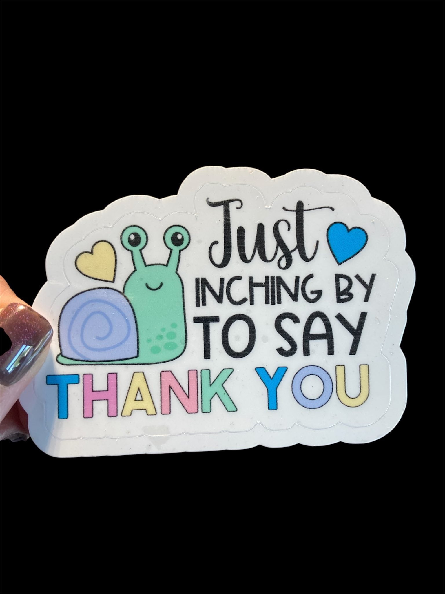 Card with a snail illustration and text 'Just inching by to say thank you' on a black background