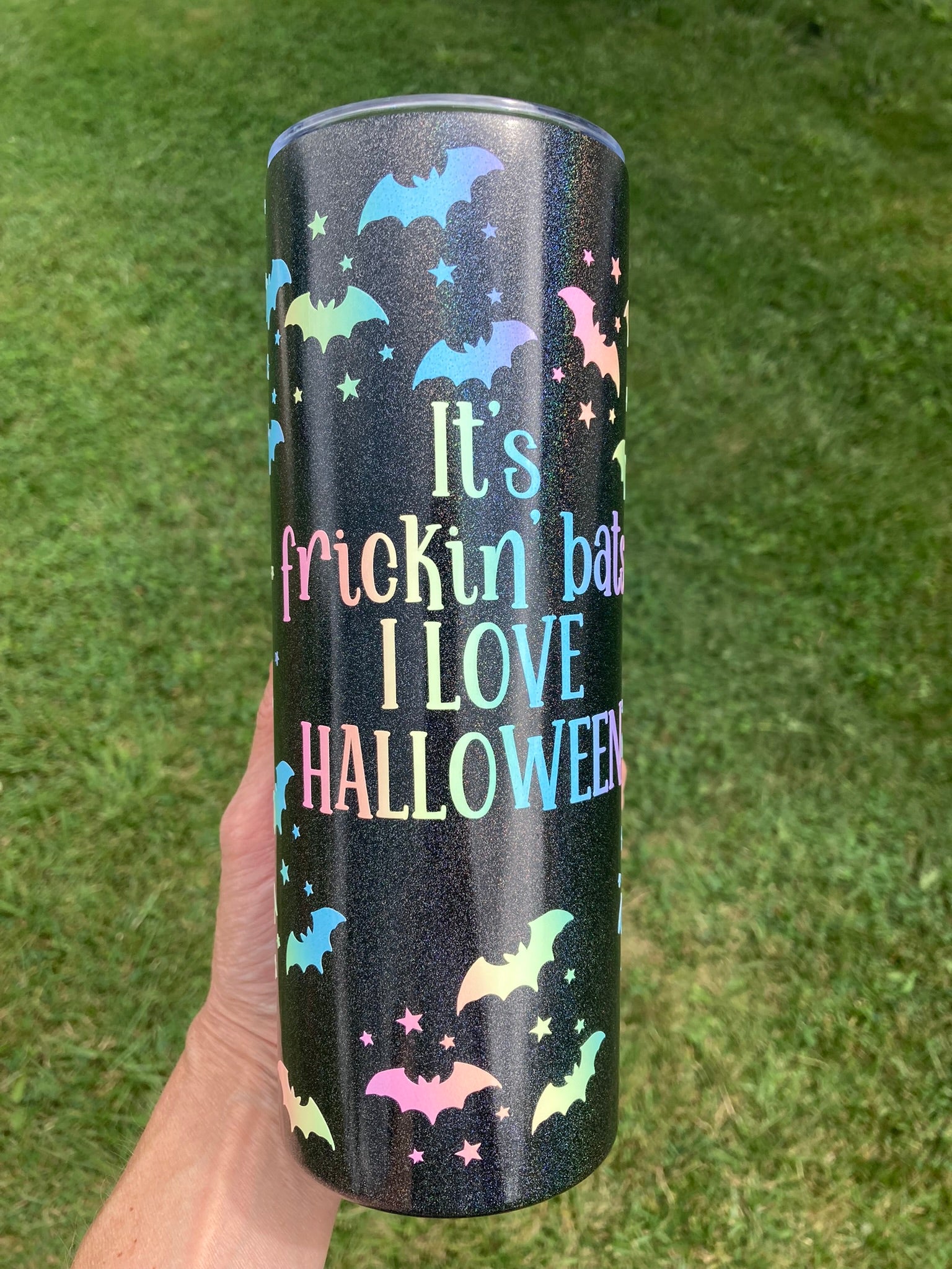 Black glitter tumbler with pastel bats and “It’s frickin bats I love Halloween” text