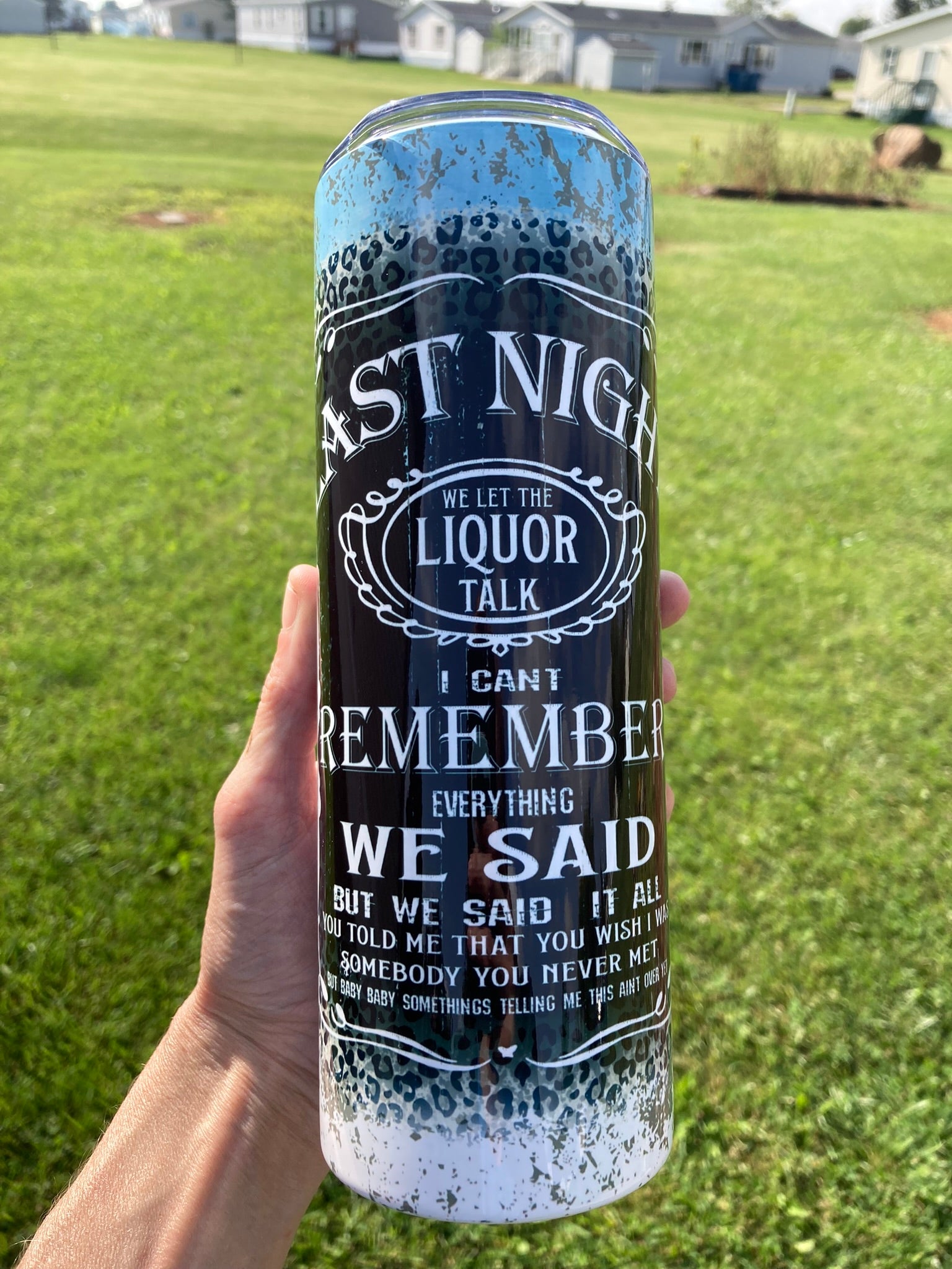 Black tumbler with vintage typography and “We Let the Liquor Talk” quote design in rustic style