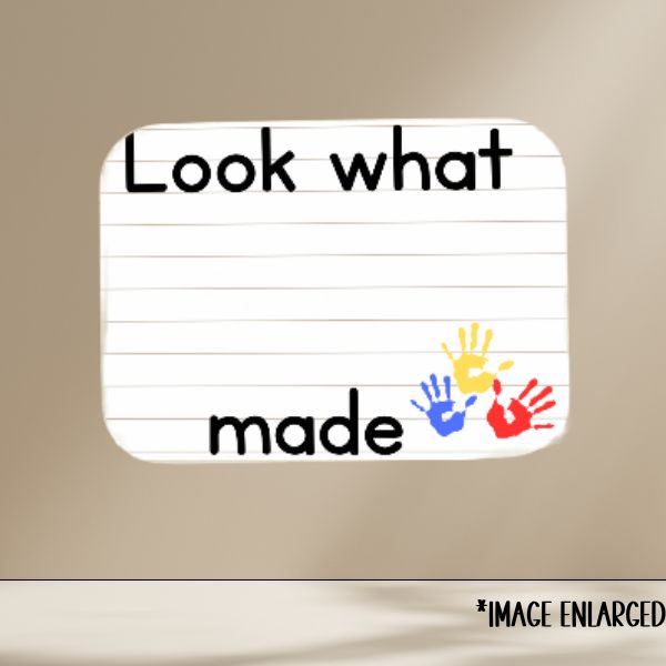 Notebook paper with colorful handprints and text on a beige background