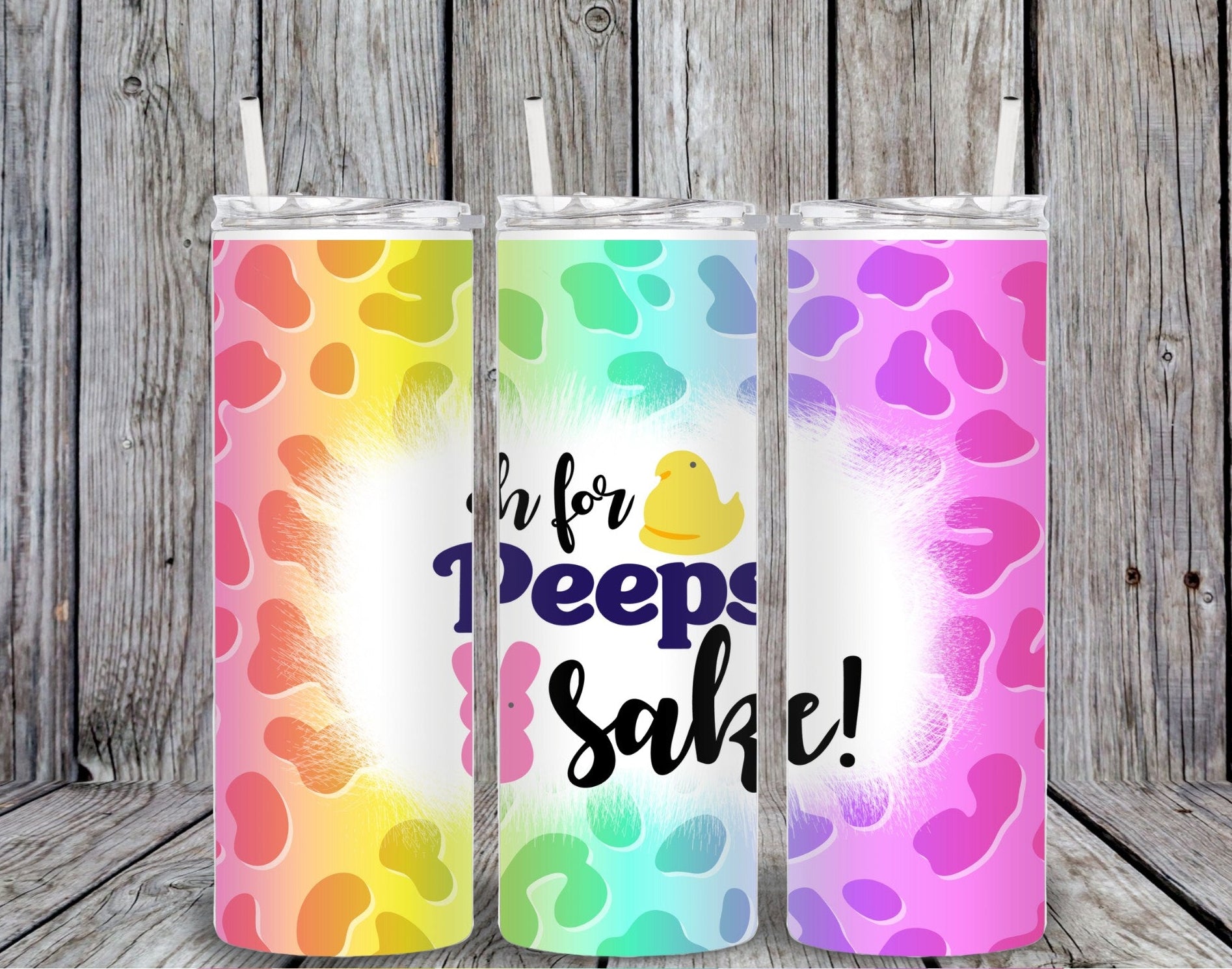 Colorful 20oz skinny tumbler featuring “Oh’ for Peeps Sake” design with rainbow splash background and peep chick illustration. MIRootsCreations