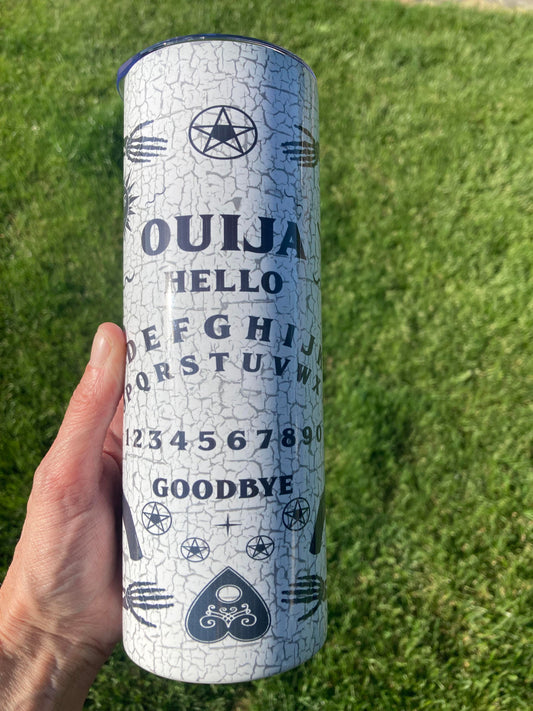 Spooky Ouija board themed Halloween tumbler, 20oz insulated skinny stainless steel cup with planchette design and straw.
