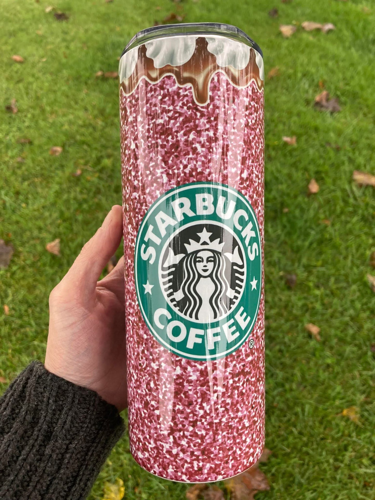 Pink glitter 20oz tumbler with Starbucks-style coffee logo and dripping chocolate top.