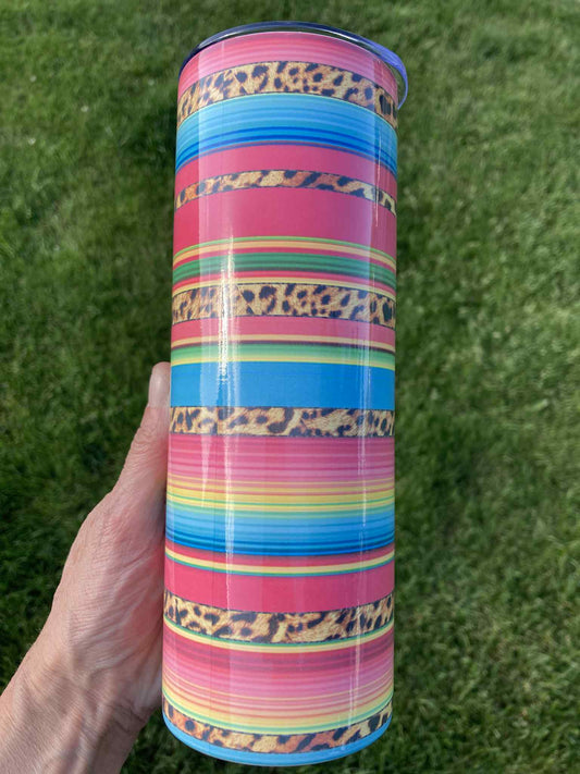 Colorful serape stripe tumbler with leopard print accents, 20oz insulated stainless steel skinny cup.