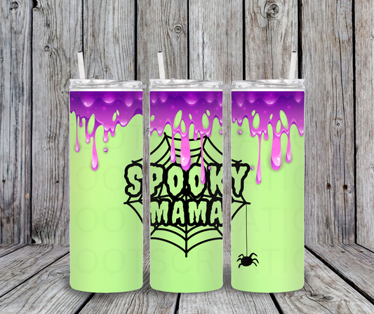 20 oz tumbler with purple 'drip' design and 'Spooky Mama' text on a wooden surface.