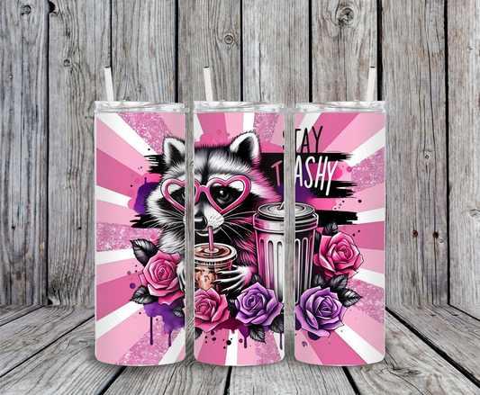 Funny raccoon tumbler with pink glitter, roses, coffee cup, trash can, and the sarcastic quote “Stay Trashy.”