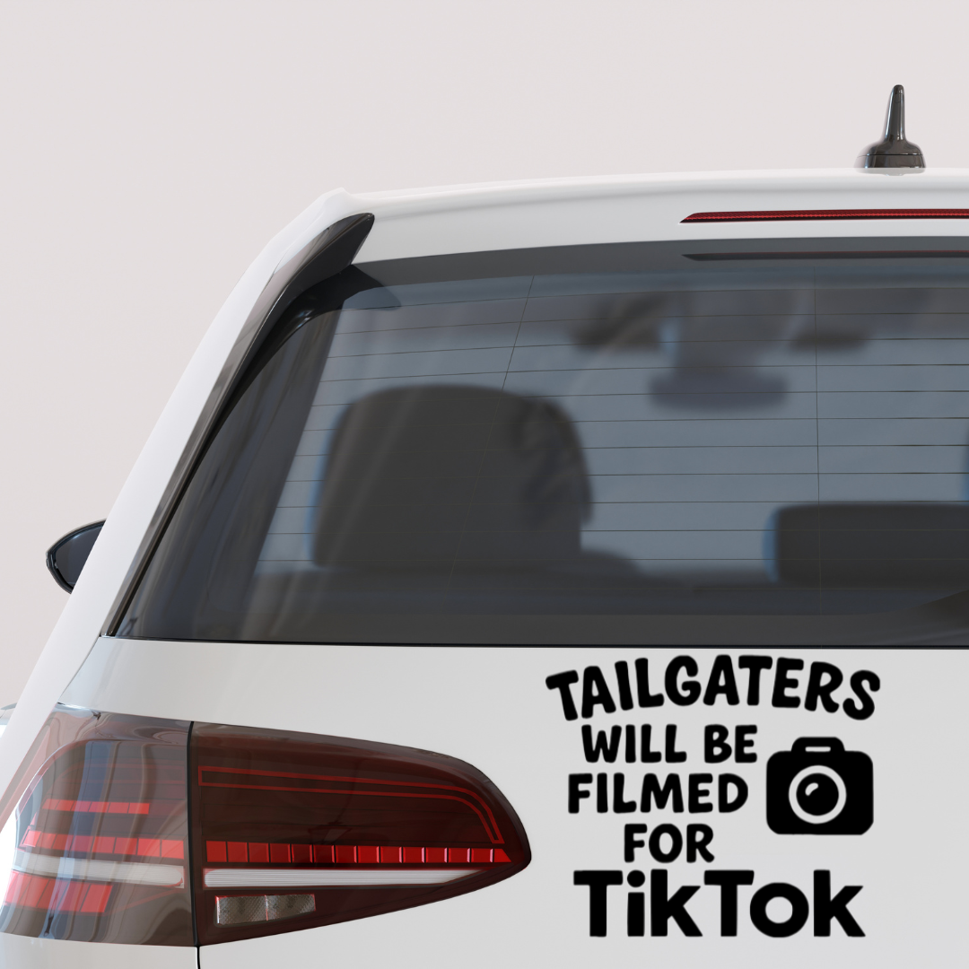 Vinyl car decal that says “Tailgaters Will Be Filmed for TikTok” with a camera icon.