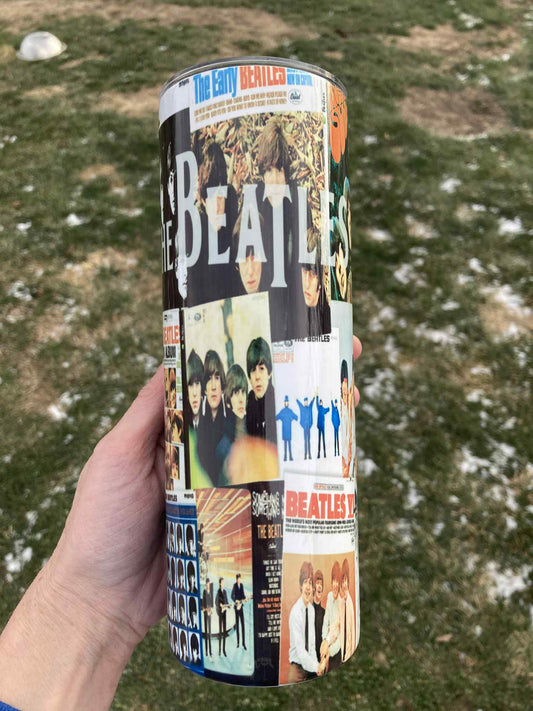 The Beatles tumbler featuring album cover collage design, 20oz insulated stainless steel skinny music cup.