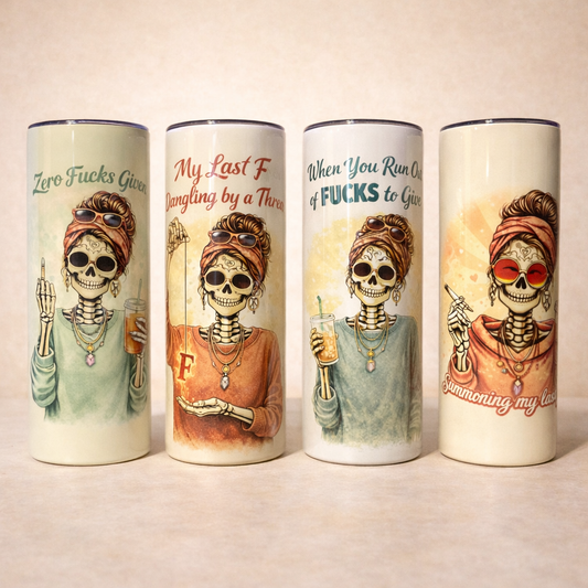 Four skeleton coffee tumblers displayed together, each with bold adult humor phrases and a cohesive illustrated skeleton character design.