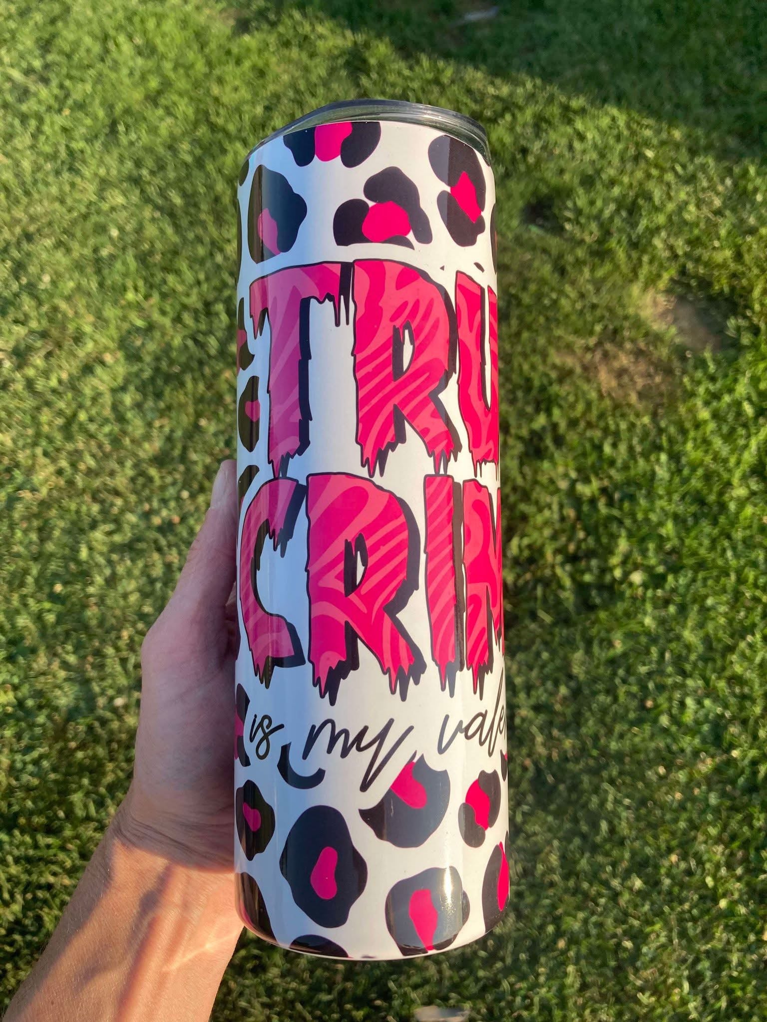 Leopard print tumbler with pink drip design and “True Crime Is My Valentine” text