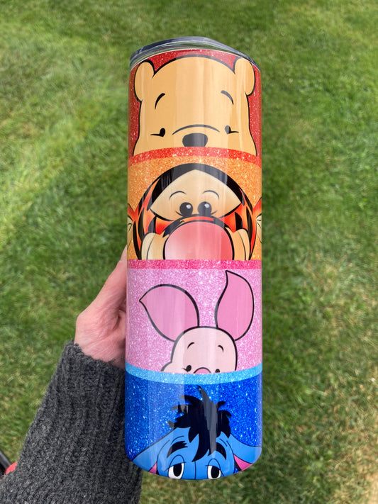 Winnie the Pooh & Friends Glitter Ombre Tumbler. 20oz tumbler featuring Winnie the Pooh, Tigger, Piglet, and Eeyore in a colorful glitter ombre design.